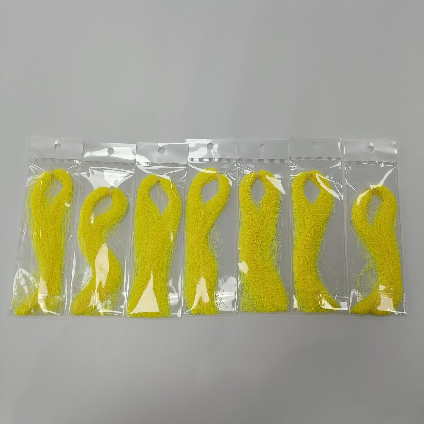 glow in the dark fluorescent  fly tying material in bags