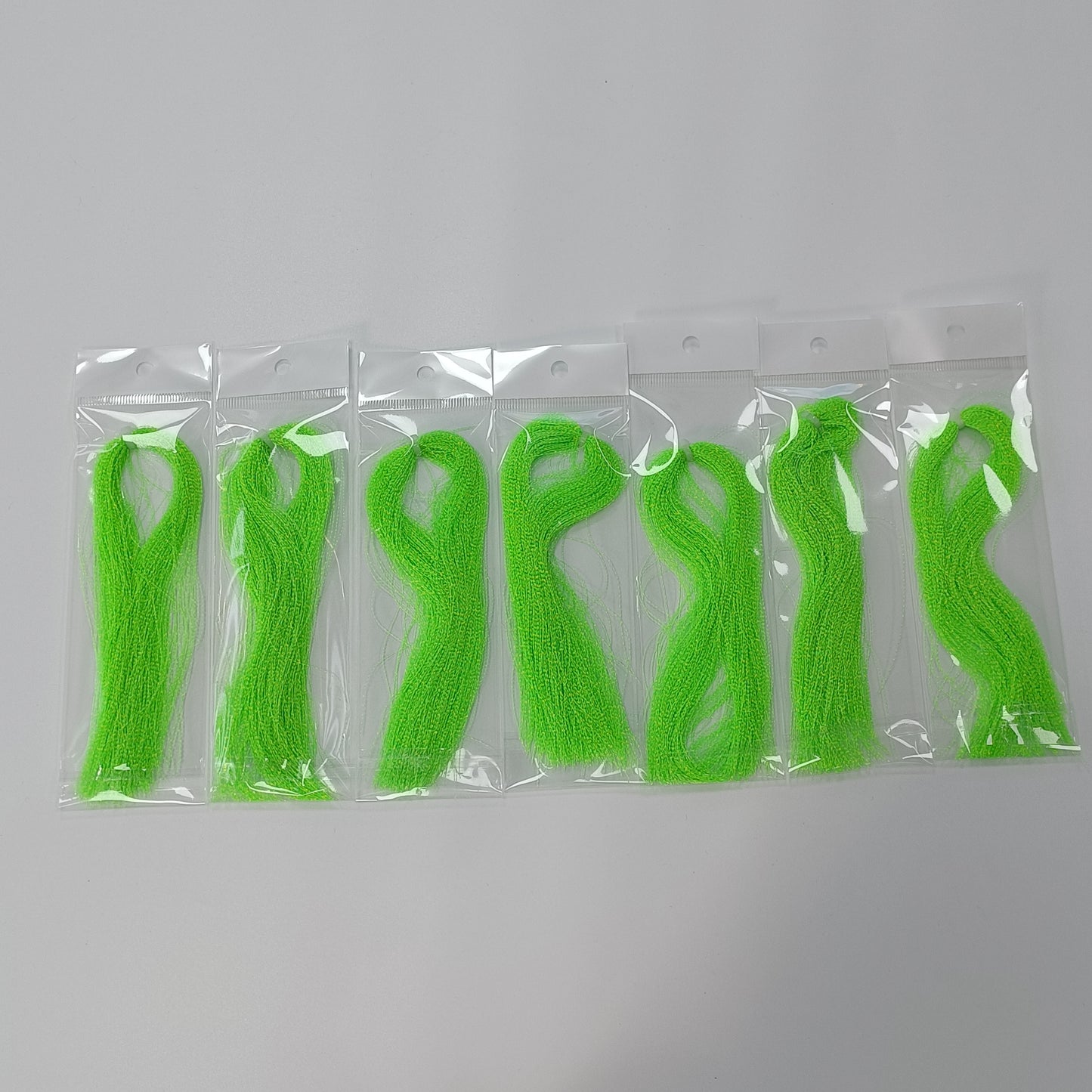 glow in the dark fluorescent  fly tying material in bags
