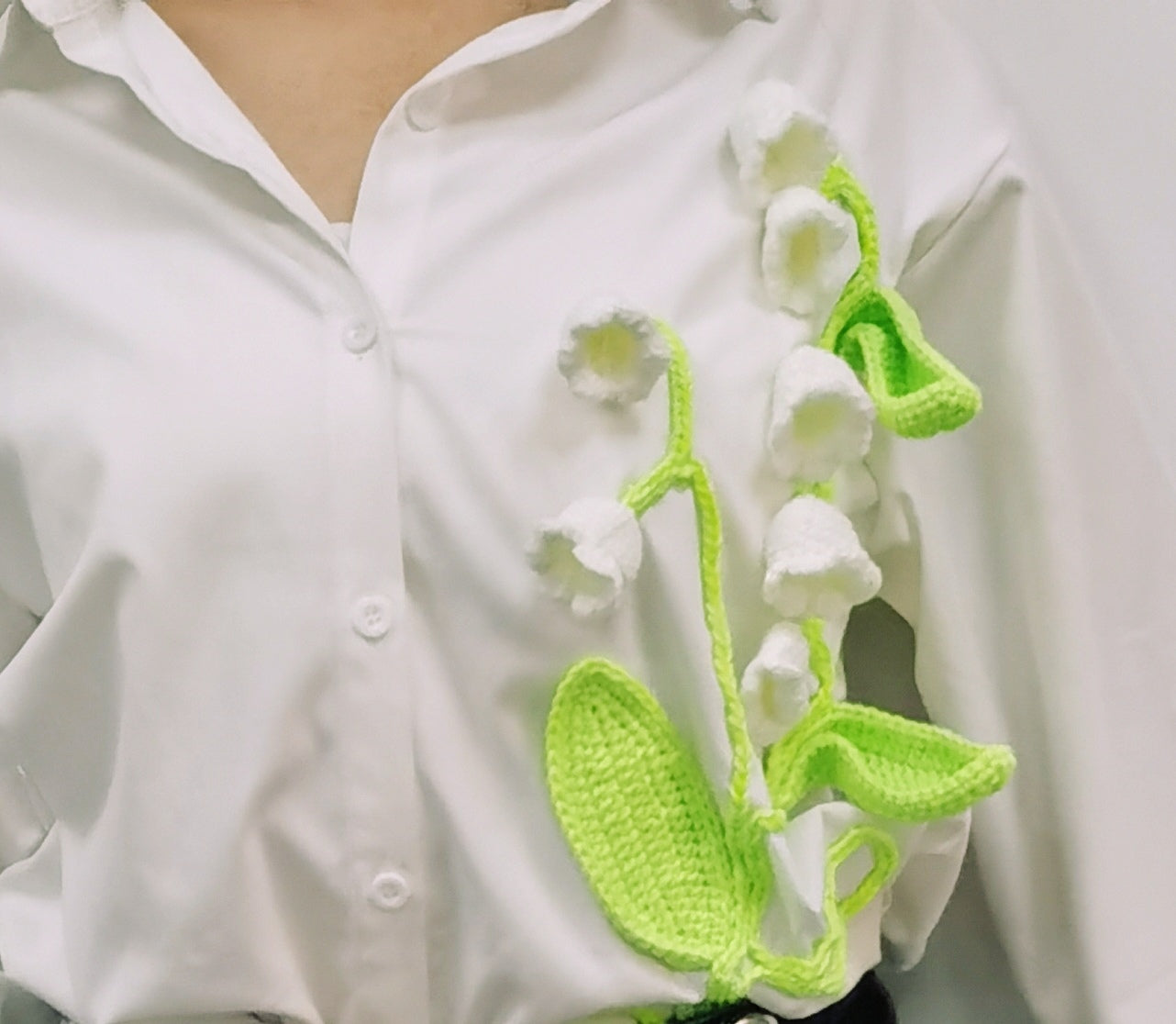 Milk Cotton Glow in the dark fluorescent crochet yarn flower under natural light